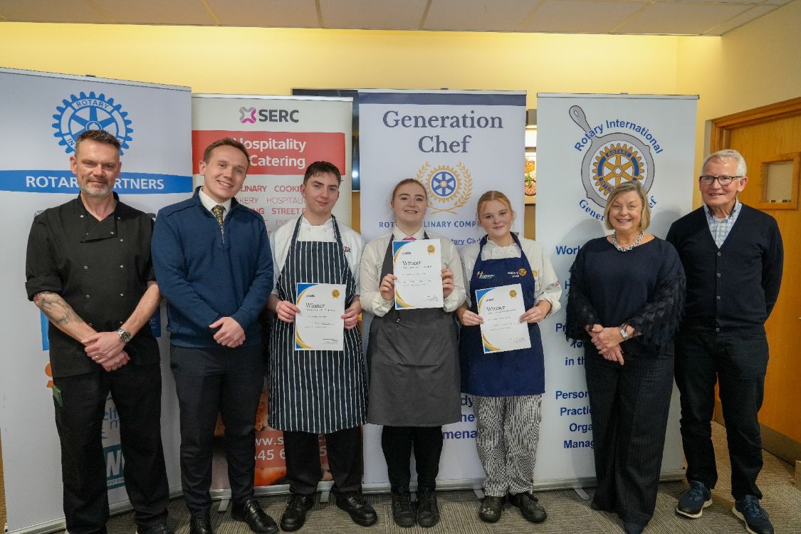 Picture of the SERC Newtownards team with their first place certificates, along with judges and sponsors